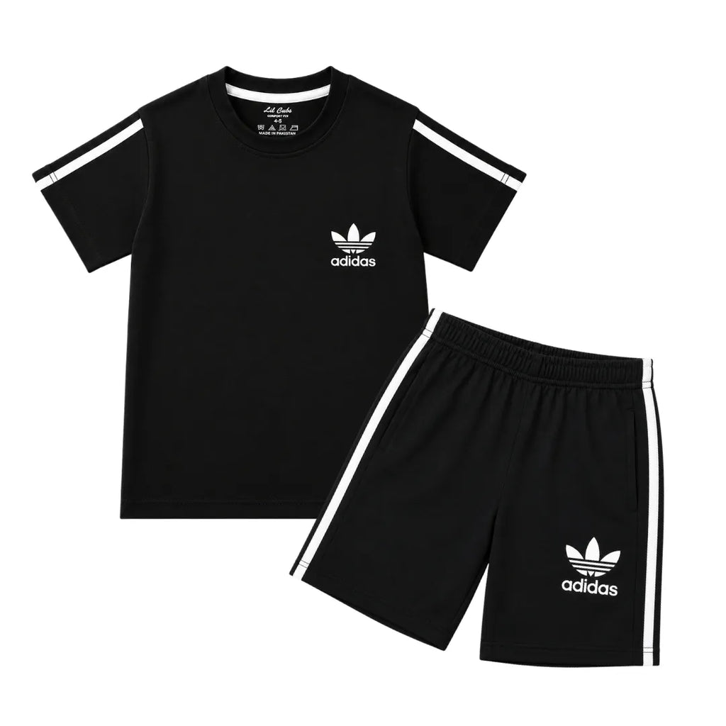 Boy wearing black Adidas summer coordinate set for boys aged 1 to 12, featuring a comfortable matching top and shorts.