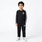 Boy wearing black Adidas summer two-piece coord set for ages 1 to 12, featuring comfortable casual style with the Lil' Cubs brand logo.