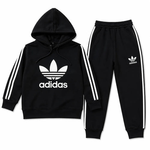 Black Adidas winter hoodie and jogger set for boys, size 1 to 12 years, by Lil' Cubs, displayed on a boy wearing the cozy coordinating outfit.
