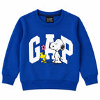 Boy wearing a blue GAP and Snoopy winter 2-piece coord set by Lil' Cubs, suitable for ages 1 to 12 years, in a cozy winter setting.
