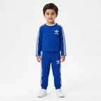 Boy wearing Lil' Cubs royal blue Adidas summer 2-piece coord set for ages 1 to 12, featuring a matching top and shorts.