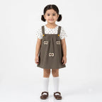 Girls brown cotton frock with bow detail, suitable for ages 3 months to 3 years, by lilcubspk.