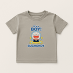  Boys’ grey graphic T‑shirt with smiling cartoon cat and “It’s a Boy! BUCHOKOY” text, front view.