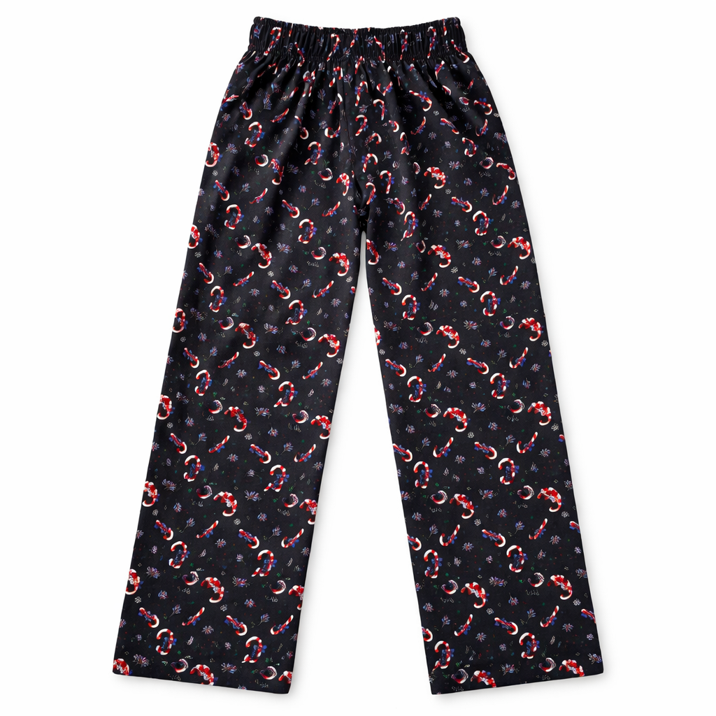 Girls navy blue cotton pajamas with celebration print from lilcubspk, featuring comfortable trousers and a cozy, playful design.
