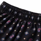 Girls' black cotton pajama trousers with paisley charm pattern from lilcubspk, featuring a comfortable and stylish design.