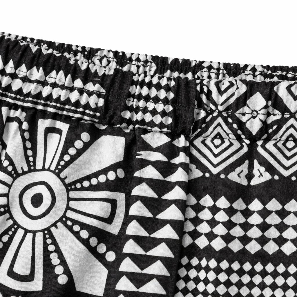Girls tribal black and white cotton pajamas trousers with a relaxed fit, featuring a comfortable waistband and trendy tribal print.