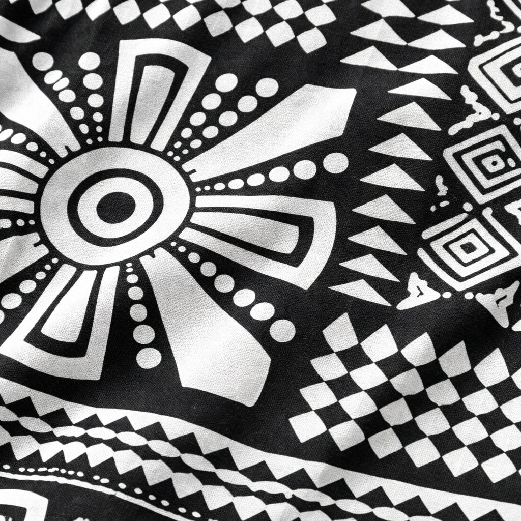 Girls tribal black and white cotton pajamas trousers with a relaxed fit, featuring a tribal pattern and comfortable waistband.