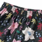 Girls' floral bloom dark grey cotton pajamas by lilcubspk, featuring a comfortable fit and cheerful floral pattern.