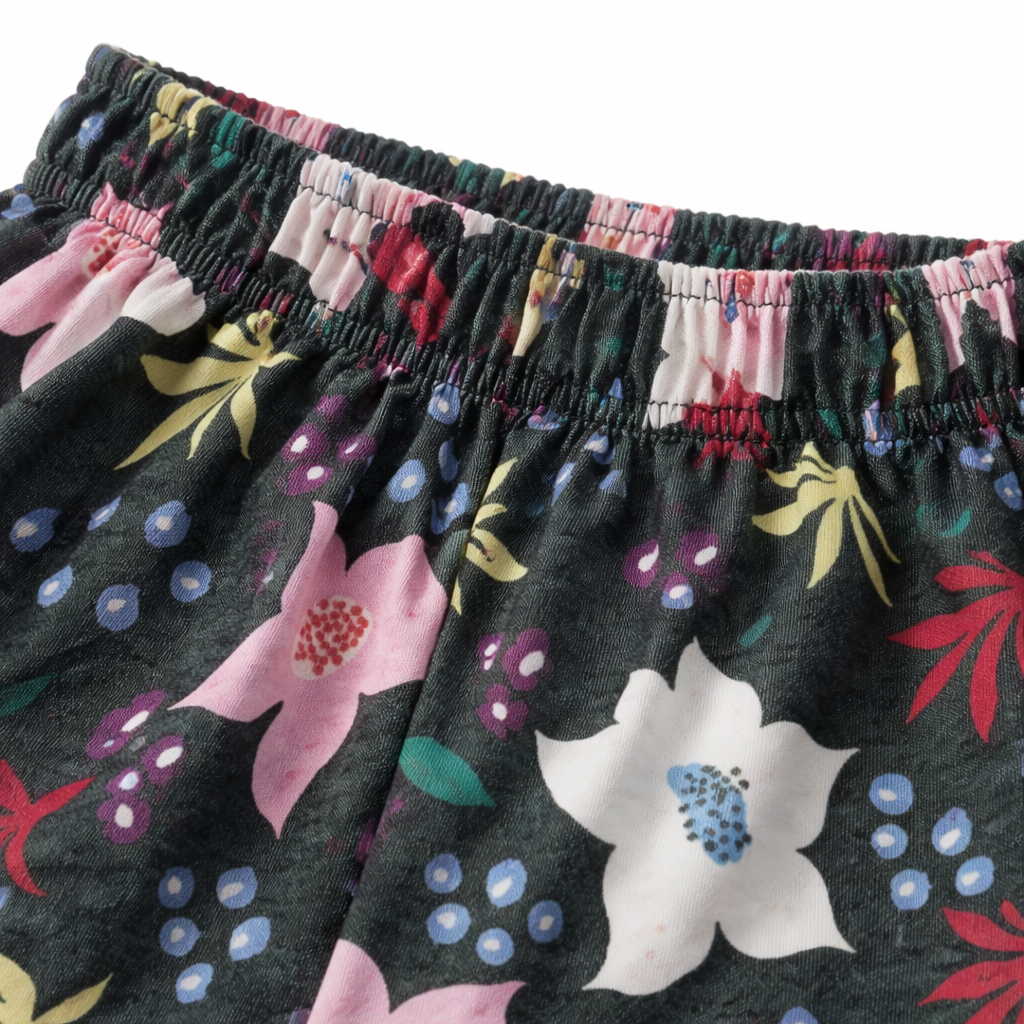 Girls' floral bloom dark grey cotton pajamas by lilcubspk, featuring a comfortable fit and cheerful floral pattern.