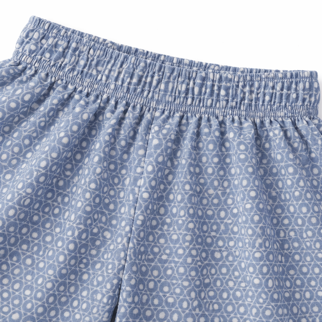 Girls' blue and white circle-patterned cotton pajamas pants by lilcubspk, featuring a comfortable relaxed fit and soft fabric.