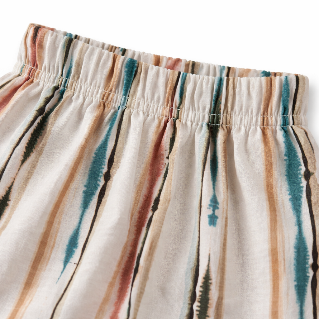 Girls' boho striped white cotton pajama trousers by lilcubspk, featuring comfortable, lightweight fabric and relaxed fit.