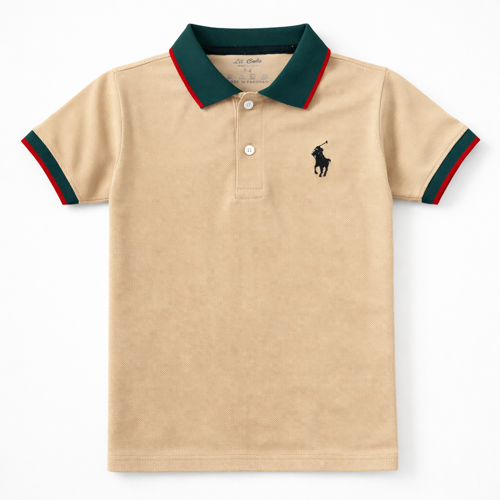 Boys skin-colored polo t-shirt by lilcubspk featuring green and red lining details on collar and sleeves.