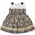 White and navy blue floral print 2-piece frock for girls by lilcubspk, featuring colorful floral patterns and comfortable fabric.