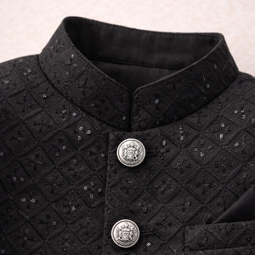 Boy wearing a black prince coat by lilcubspk, featuring a classic design with buttons and a tailored fit.