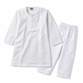 Boy wearing white cotton shalwar kameez, traditional Pakistani outfit for boys, in a comfortable and stylish design by lilcubspk.