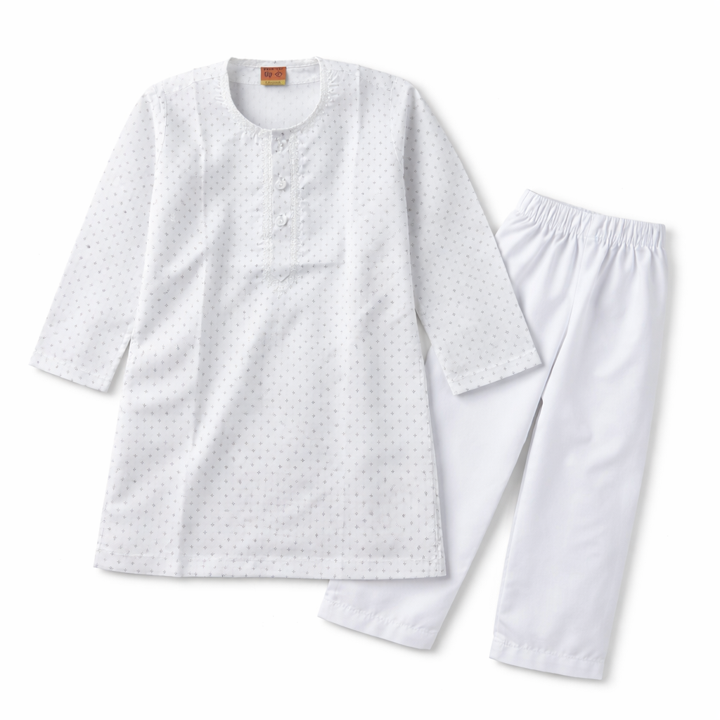 Boy wearing white cotton shalwar kameez, traditional Pakistani outfit for boys, in a comfortable and stylish design by lilcubspk.