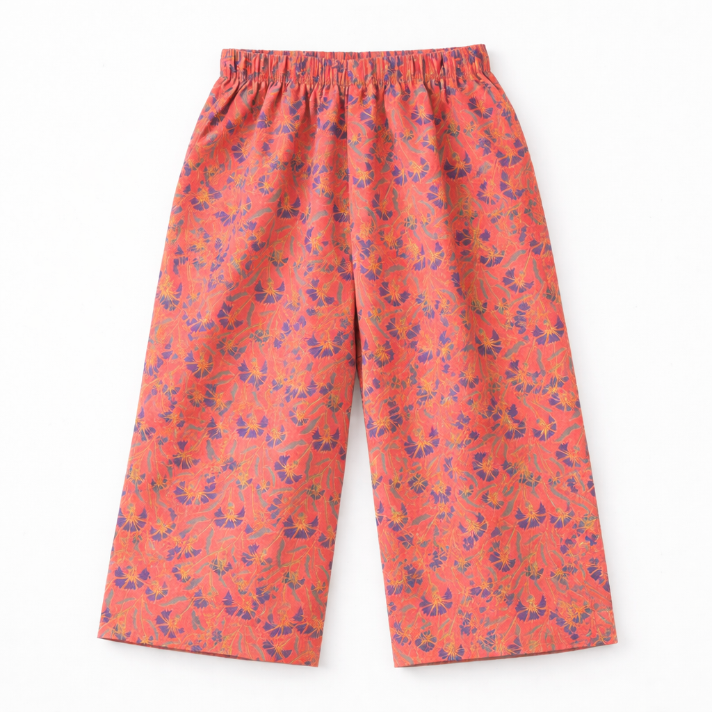 Orange floral print girls' kurti pajama set by lilcubspk, featuring a vibrant kurti top and matching pajama bottoms.