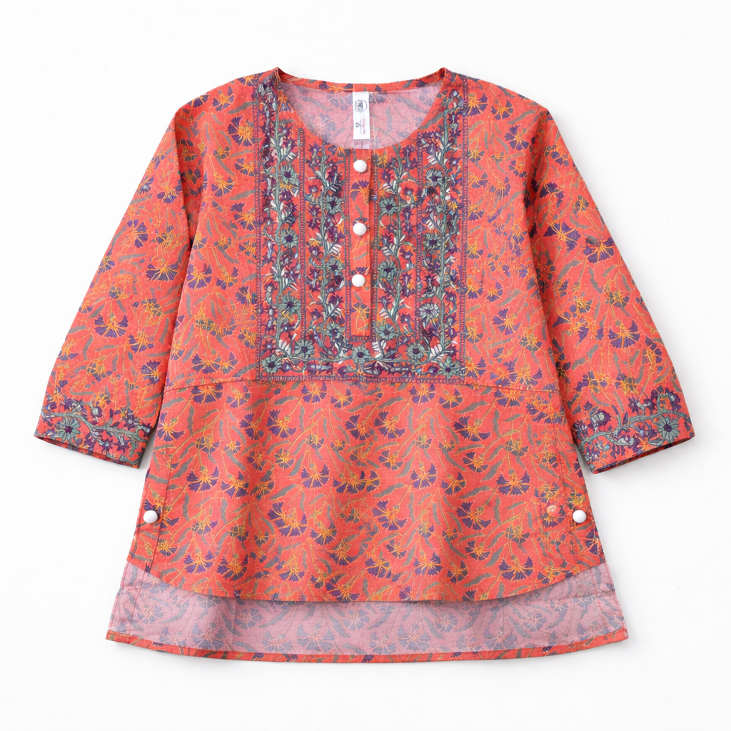 Orange floral print kurti pajama set for girls by lilcubspk, featuring a comfortable kurti and matching pajama with vibrant floral design.