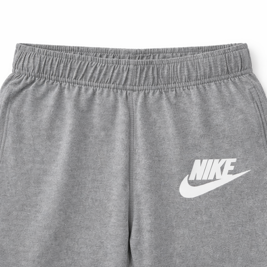 Set of three boys' cotton Nike basic trousers by lilcubspk, shown in a pack with navy, gray, and black colors.