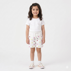 Girls white denim shorts with butterfly embroidery from lilcubspk, suitable for ages 6 months to 5 years, featuring a stylish design.