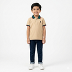 Boys Skin Polo T-Shirt by lilcubspk featuring green and red lining, with a classic polo collar and short sleeves, laid flat.