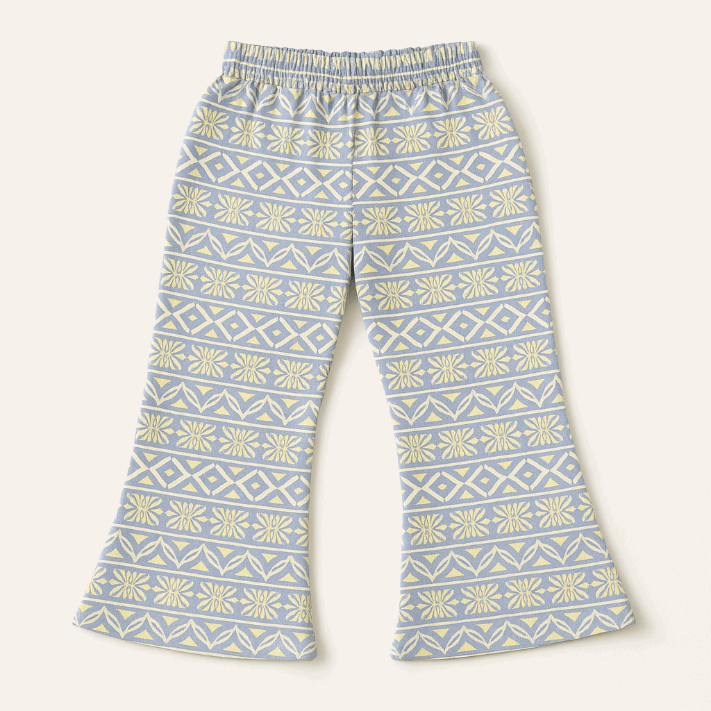 “Geo‑print flare pants in grey with blue and yellow accents, elastic waistband, laid flat.”
