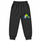 Girls black Adidas pocket winter hoodie and jogger set by Lil' Cubs, made for ages 1 to 12 years, featuring cozy fabric and sporty style.
