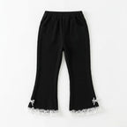 Girls black ribbed imported trousers for ages 3 to 12 years, featuring comfortable fabric and stylish fit by Lil' Cubs.