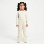 Girls white imported rib trouser by Lil' Cubs, showing a comfortable, stretchy fabric design for ages 3 to 12 years.