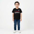 Black cotton kids T-shirt with Labbaik Ya Hussain print, suitable for ages 1 to 12, from Lil Cubs Muharram edition.