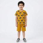 Boys mustard Mickey Mouse summer 2-piece coord set, featuring a Mickey print shirt and shorts for ages 12 months to 10 years.
