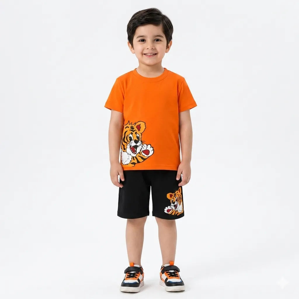 Boy wearing an orange tiger-themed summer coord set by lilcubspk, featuring a short-sleeve top and shorts for ages 1-12.