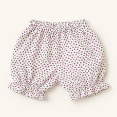 Close-up of floral print baby girl bloomers